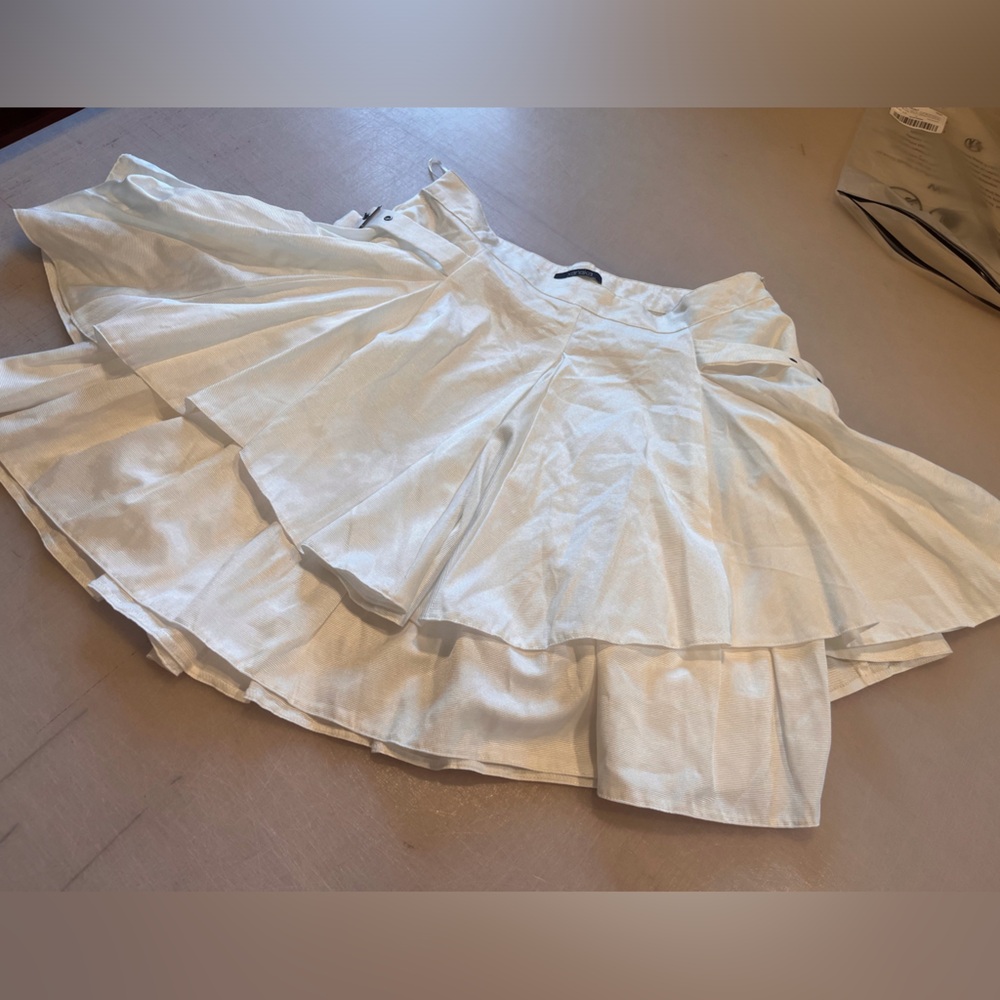 Flouncy full cream skirt.
